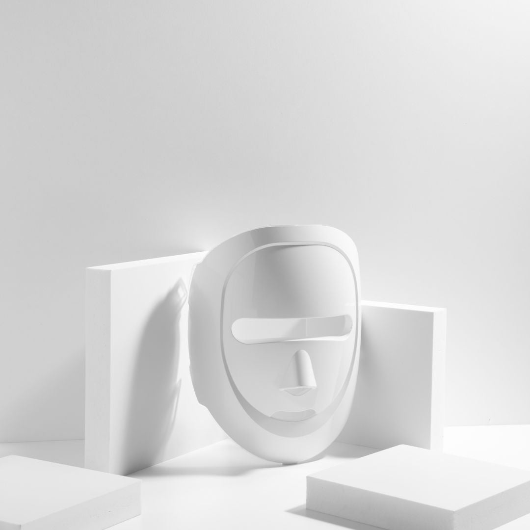 White abstract sculpture on a light gray background