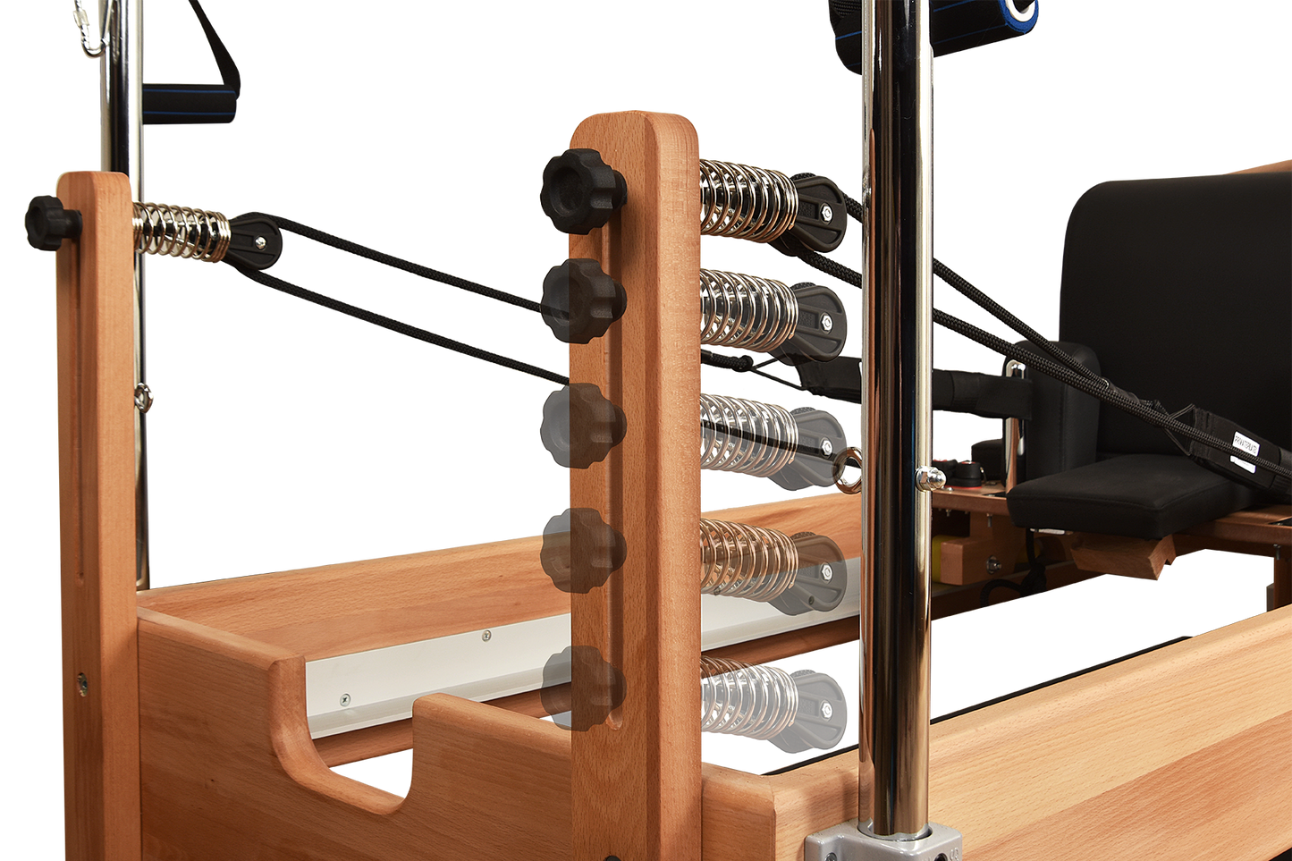 Wooden exercise machine with springs and metal components on a white background