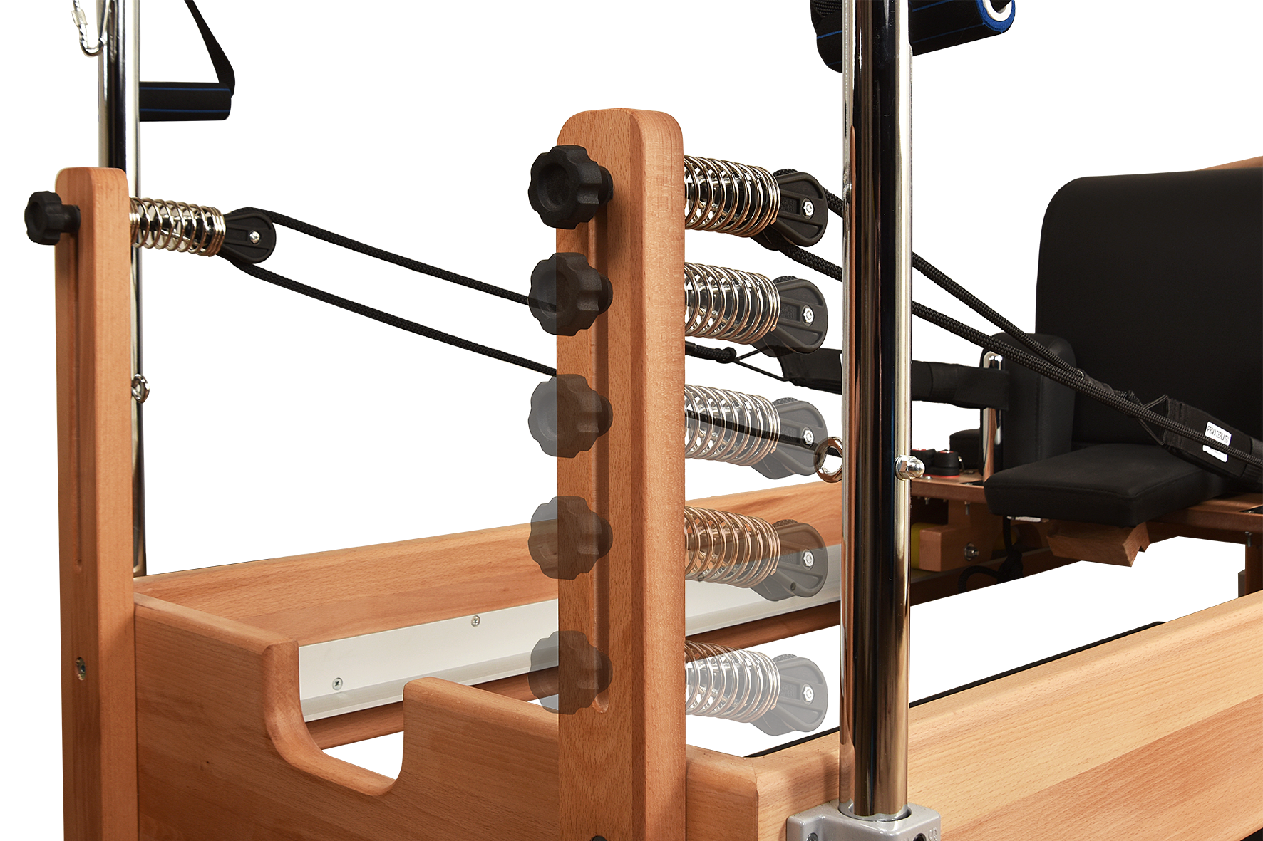 Wooden exercise machine with springs and metal components on a white background