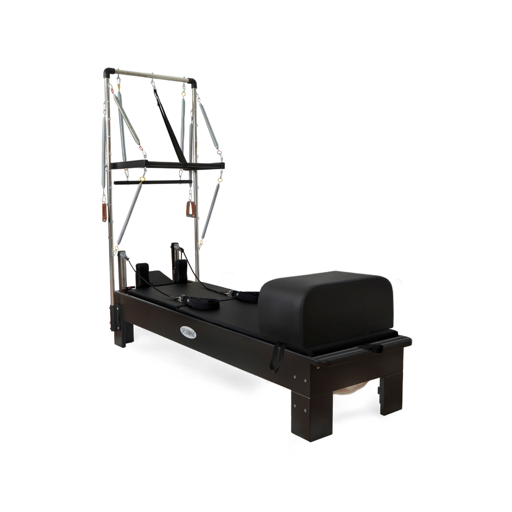 Pilates reformer machine on a white background