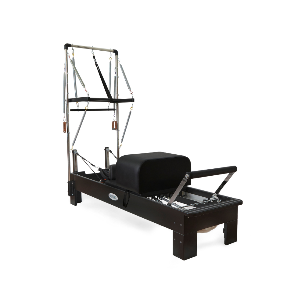 Pilates reformer machine on a white background