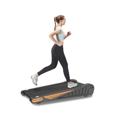 Under desk walking pad for home office compact treadmill in use