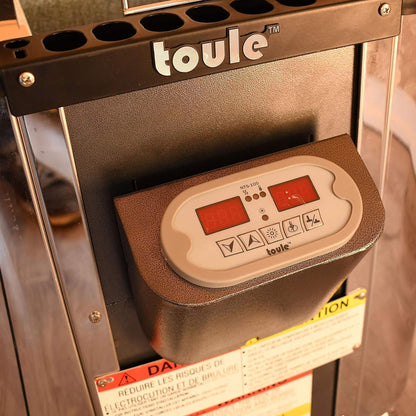 Toule product with digital display and control panel on a metallic surface