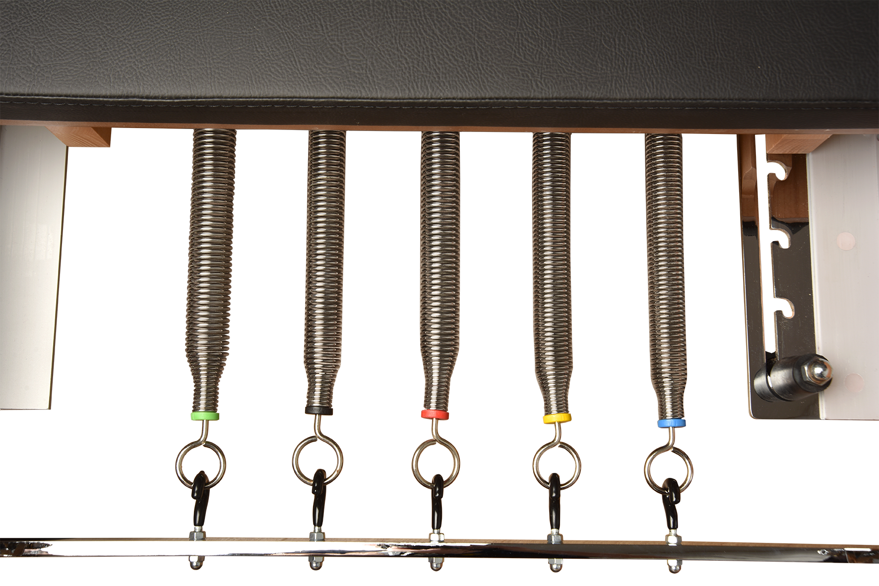 Set of fishing rigs with springs and hooks on a metal rod against a white background